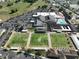 Aerial view of community and bocce ball courts at 243 Linger Ln, Sun City Center, FL 33573