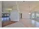 Bright dining area with tile and wood floors, and views to the living room at 243 Linger Ln, Sun City Center, FL 33573