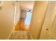 View down a hallway to the living room at 2750 E Bay Dr # 1E, Largo, FL 33771