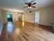 Living room with wood flooring and ceiling fan at 2750 E Bay Dr # 1E, Largo, FL 33771