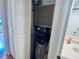 Closet with water heater and air filter at 2750 E Bay Dr # 1E, Largo, FL 33771