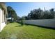 Spacious backyard with grassy lawn and privacy fence at 2930 49Th S Ter, St Petersburg, FL 33712