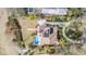 Bird's eye view of a home with a pool, dock, and waterfront access at 314 Shore E Dr, Oldsmar, FL 34677