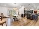 Bright dining room adjacent to kitchen and hardwood floors at 314 Shore E Dr, Oldsmar, FL 34677