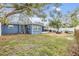 Backyard view of the house and surrounding area at 3303 Bainbridge Dr, Holiday, FL 34691