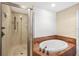 Bathroom features a large soaking tub and walk-in shower at 3560 Tripoli Blvd, Punta Gorda, FL 33950