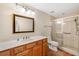 Clean bathroom with walk-in shower and updated vanity at 3560 Tripoli Blvd, Punta Gorda, FL 33950