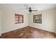 Simple bedroom with tile floors and ceiling fan at 3560 Tripoli Blvd, Punta Gorda, FL 33950