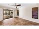 Bedroom with tile floors, sliding glass doors to patio at 3560 Tripoli Blvd, Punta Gorda, FL 33950