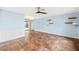 Spacious living room with light blue walls and tile floors at 3560 Tripoli Blvd, Punta Gorda, FL 33950