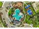 Aerial view of community amenities including pool, playground, and sports courts at 3632 Forest Path Dr, Plant City, FL 33565