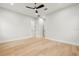 Bedroom featuring hardwood floors, white walls, and white doors at 3640 15Th N St, St Petersburg, FL 33704