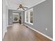 Living room with hardwood floors, gray walls, and an office nook at 37620 Howard Ave, Dade City, FL 33525