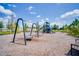 Community playground with swings and play structures at 3945 Northern Key Dr, Plant City, FL 33563