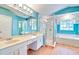 Bathroom with a shower, bathtub, and double vanity at 4020 Concord Way, Plant City, FL 33566
