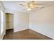 Bright bedroom featuring wood-look tile floors and a large closet at 4020 Concord Way, Plant City, FL 33566