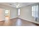 Main bedroom with tile floors and ensuite bathroom at 4020 Concord Way, Plant City, FL 33566