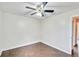 Spacious bedroom with ceiling fan and tile flooring at 4020 Concord Way, Plant City, FL 33566