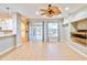 Bright Gathering room featuring tile floors, built-in shelving, and sliding glass doors at 4020 Concord Way, Plant City, FL 33566