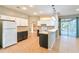 Kitchen with two-toned cabinets, tile floor and island at 4020 Concord Way, Plant City, FL 33566