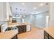 Kitchen with two-toned cabinets, tile floor and island at 4020 Concord Way, Plant City, FL 33566