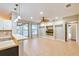 Open living room with tile floors and built-in shelving at 4020 Concord Way, Plant City, FL 33566