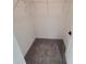 Large walk in closet with carpeted flooring at 4066 Irish Ter, North Port, FL 34288