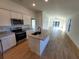 Modern kitchen with stainless steel appliances and island at 4066 Irish Ter, North Port, FL 34288