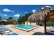 Relaxing community pool with ample lounge chairs and shade at 4498 Lake Blvd, Clearwater, FL 33762