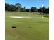 Scenic golf course view with sand trap and flags at 4498 Lake Blvd, Clearwater, FL 33762