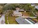 Aerial view of property, highlighting the house and surrounding landscape at 4646 W Longfellow Ave, Tampa, FL 33629