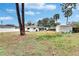 Large backyard with shed and partial fence at 4646 W Longfellow Ave, Tampa, FL 33629