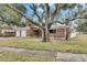 Brick house with a two-car garage at 4646 W Longfellow Ave, Tampa, FL 33629