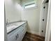 Bathroom with double vanity and granite countertop at 5701 N 20Th St, Tampa, FL 33610