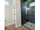 Modern bathroom with a frameless glass shower at 5701 N 20Th St, Tampa, FL 33610