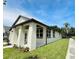 New construction home with side yard and landscaping at 5701 N 20Th St, Tampa, FL 33610