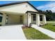 Craftsman style home with covered front porch and walkway at 5701 N 20Th St, Tampa, FL 33610