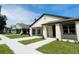 New construction homes with street view and landscaping at 5701 N 20Th St, Tampa, FL 33610