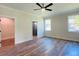 Main bedroom with hardwood floors and walk-in closet at 5701 N 20Th St, Tampa, FL 33610