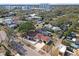 Aerial view of a single story home with a large backyard and surrounding neighborhood at 600 30Th N St, St Petersburg, FL 33713