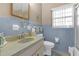 Bathroom with single sink, toilet, and shower/tub at 600 30Th N St, St Petersburg, FL 33713