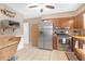 Kitchen with stainless steel appliances and wood cabinets at 600 30Th N St, St Petersburg, FL 33713