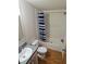 Simple bathroom with shower/tub combo and wood-look flooring at 6274 Boatwrite Rd, Spring Hill, FL 34609