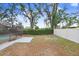 Spacious backyard with a screened pool at 6543 Spanish Moss Cir, Tampa, FL 33625