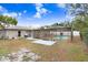 Charming backyard with a pool and patio at 6543 Spanish Moss Cir, Tampa, FL 33625