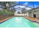 Inviting screened pool with a spacious deck at 6543 Spanish Moss Cir, Tampa, FL 33625