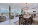 Elegant dining area with wood table and kitchen views at 7600 Sun Island S Dr # 804, South Pasadena, FL 33707