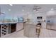 Modern kitchen with granite island and stainless steel appliances at 7600 Sun Island S Dr # 804, South Pasadena, FL 33707