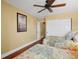 Bedroom with two twin beds and ceiling fan at 800 S Gulfview Blvd # 101, Clearwater Beach, FL 33767