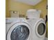 Laundry closet with washer and dryer at 800 S Gulfview Blvd # 101, Clearwater Beach, FL 33767